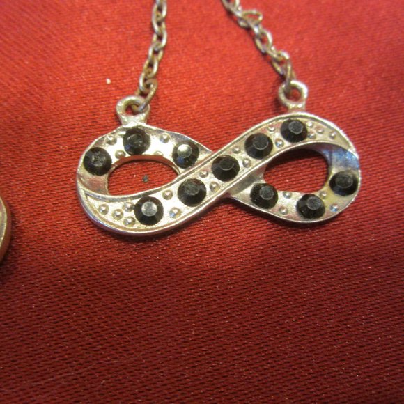 VTG PAIR OF PIERCED EARRINGS, SILVERTONE W/INFINITY SYMBOL, W/BLACK CRYSTALS - Picture 3 of 3